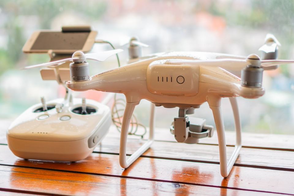 Civilian quadcopter and control panel on the table